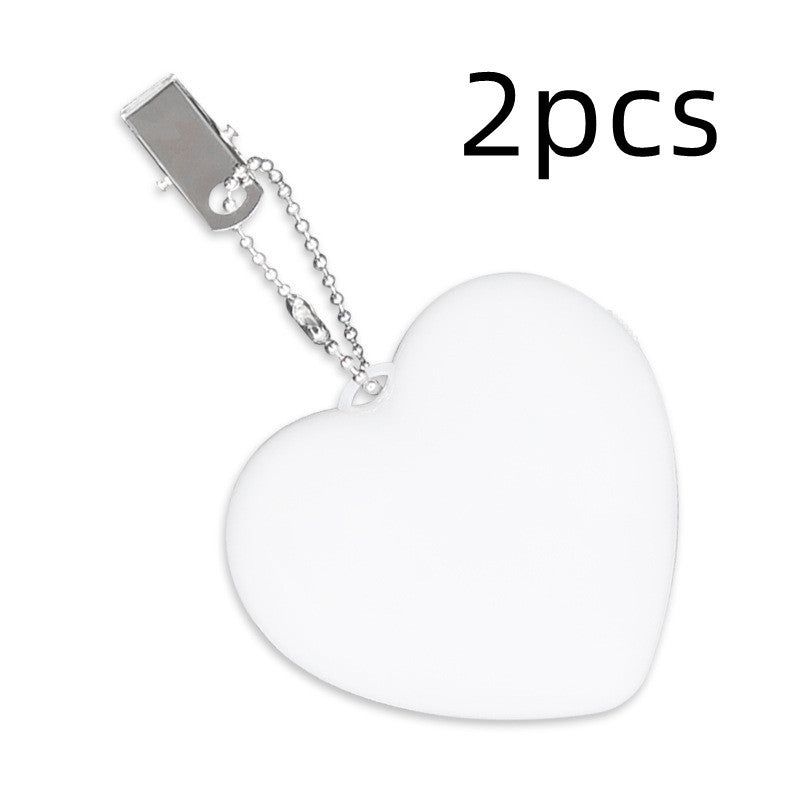 Lumière de sac à main cœur: Pratique, chic et lumineuse!